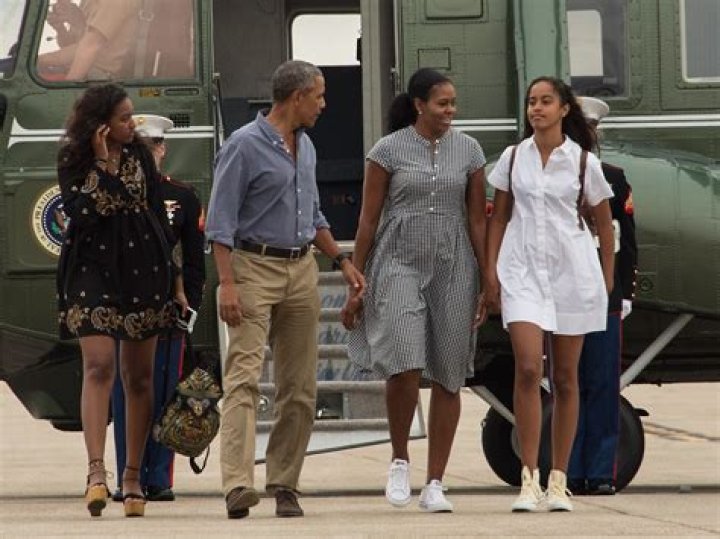 Barack & Michelle Obama Hold Hands Out With Steven Spielberg In Spain: Photos