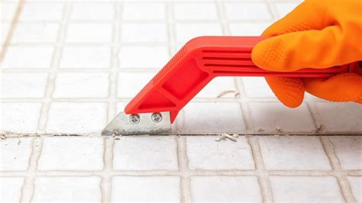 Can you use a Dremel tool to remove grout?