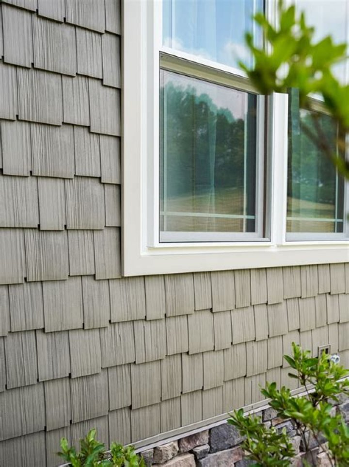 Is vinyl cedar shake siding expensive?