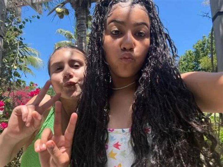 North West, 7, & Cousin Penelope Disick, 8, Are So Cute ‘Daydreaming’ On The Beach — See Pics
