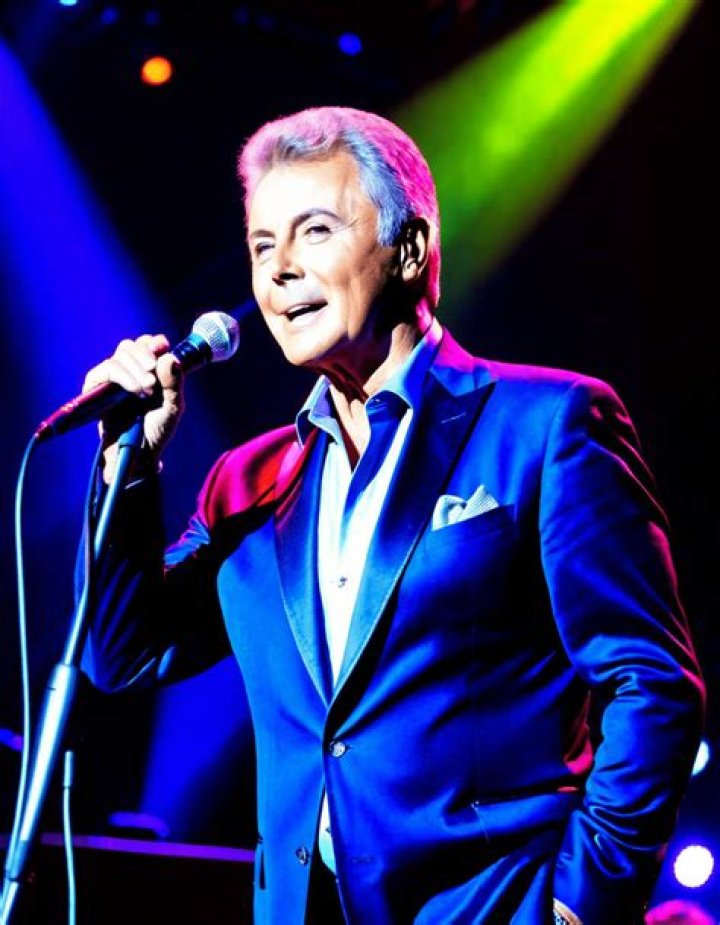 Photos Of The Legendary Singer – Hollywood Life