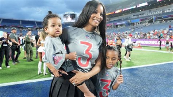 Russell Wilson Holds His Daughter Sienna, 2, Up By The Legs During Adorable Workout Session