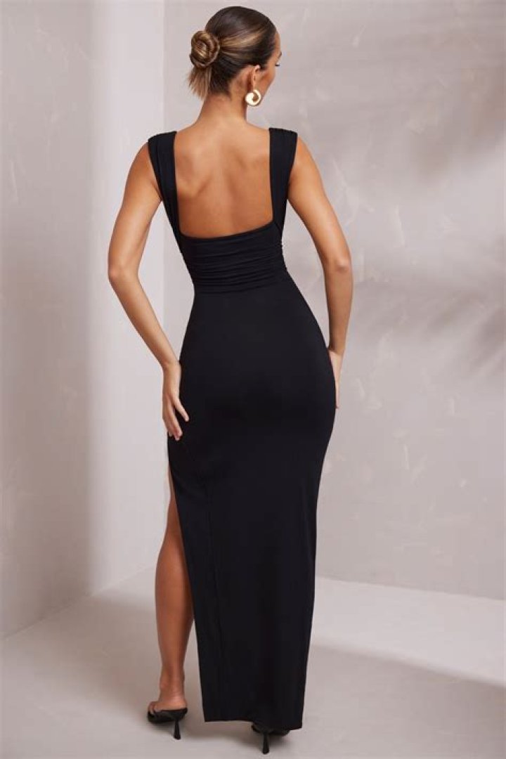 Tiny Looks Sexier Than Ever In Teeny-Tiny, Plunging Black Dress
